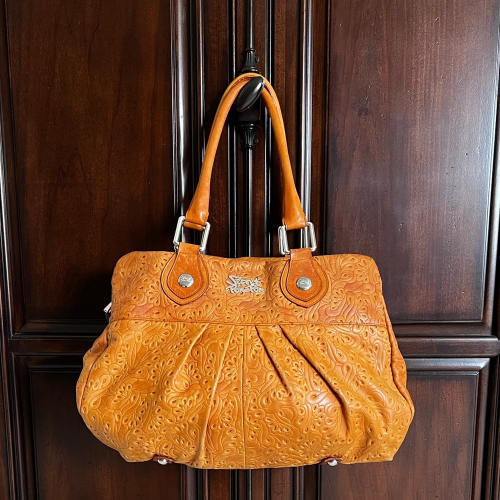 SÉCRET PON PON Leather tote.